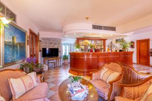 TV a/nebo společenská místnost v ubytování Hotel Ostrea