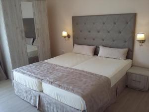 Postel nebo postele na pokoji v ubytování Guest House Adriya