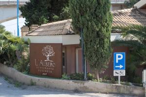 Certifikát, hodnocení, plakát nebo jiný dokument vystavený v ubytování L'Albero