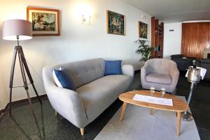 Posezení v ubytování Hotel Port-Bo