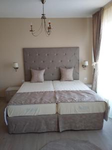 Postel nebo postele na pokoji v ubytování Guest House Adriya