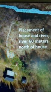 ein Buch mit den Wörtern Haus, Fluss und Flussmeter nördlich in der Unterkunft Nix at Gammel Rye in Ry
