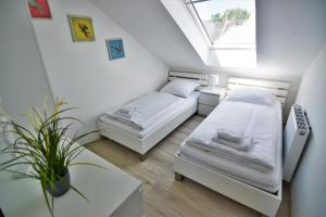 Katil atau katil-katil dalam bilik di Exclusive Apartment Cologne