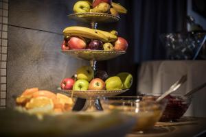 a display of fruit on three tiers on a table at First Hotel Witt in Kalmar