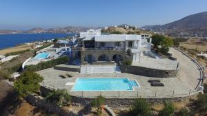 an aerial view of a house with a swimming pool at Terra in Parikia