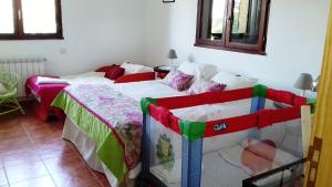 Cama o camas de una habitación en El Agave de Gavilanes