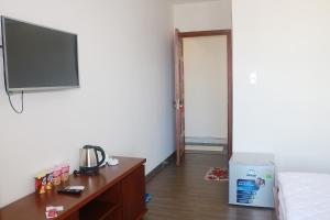 TV a/nebo společenská místnost v ubytování My Ca Hotel
