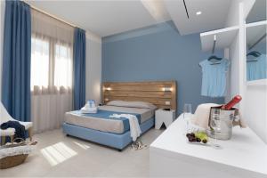 Posteľ alebo postele v izbe v ubytovaní B&B Acqua Azzurra