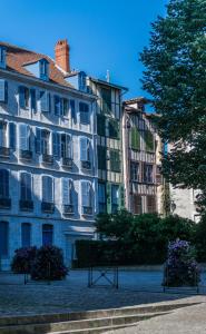 a group of tall buildings in a city at bayonne centre in Bayonne +9 photos