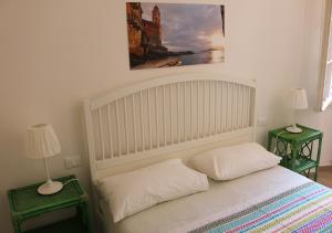Tempat tidur dalam kamar di Villetta Ponchielli