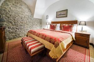 Postel nebo postele na pokoji v ubytování Arcadia Boutique Hotel