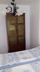 Postel nebo postele na pokoji v ubytování Apartmani Luja