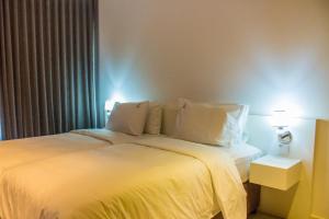 Postel nebo postele na pokoji v ubytování Palm Aparthotel