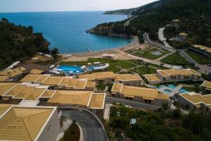 an aerial view of a resort next to the water at Thassos Grand Resort in Alyki