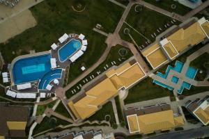 an overhead view of a resort with a swimming pool at Thassos Grand Resort in Alyki