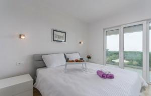 Postel nebo postele na pokoji v ubytování Villa Wonderview