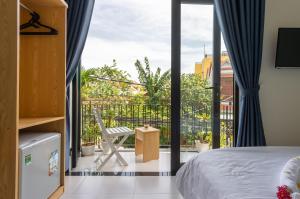 Un balcón o terraza de D Central Hoi An Homestay