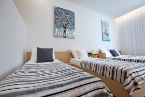 Postel nebo postele na pokoji v ubytování Dream Hotel