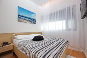 Postel nebo postele na pokoji v ubytování Dream Hotel