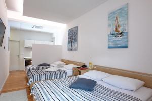 Postel nebo postele na pokoji v ubytování Dream Hotel