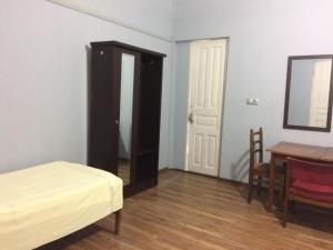 Letto o letti in una camera di Natia Guest House