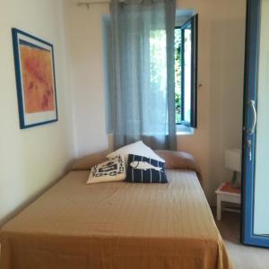 A bed or beds in a room at Il Gamberino