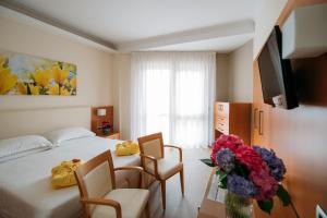 TV a/nebo společenská místnost v ubytování Hotel Terme Antoniano