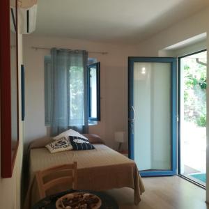 A bed or beds in a room at Il Gamberino
