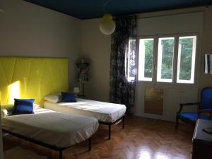 Postel nebo postele na pokoji v ubytování Beaucoeur