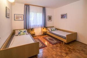 Postel nebo postele na pokoji v ubytování Apartments Palme
