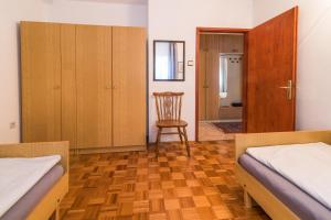 Postel nebo postele na pokoji v ubytování Apartments Palme