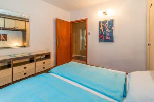 Postel nebo postele na pokoji v ubytování Apartments Palme