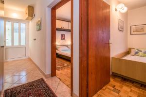 Postel nebo postele na pokoji v ubytování Apartments Palme