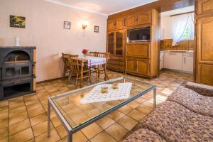 Kuchyň nebo kuchyňský kout v ubytování Apartments Palme