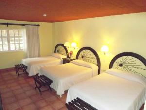 Katil atau katil-katil dalam bilik di Hotel Chichen Itza