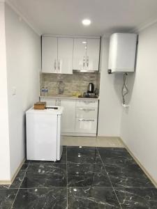 Una cocina o cocineta en Senturkler Suite
