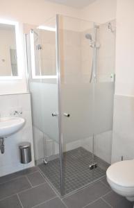 Kupatilo u objektu Avalon Hotel Bellevue