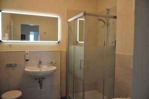 Kupatilo u objektu Avalon Hotel Bellevue