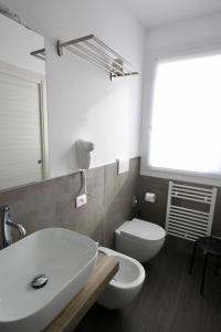 Koupelna v ubytování Pove 2.4 Hotel