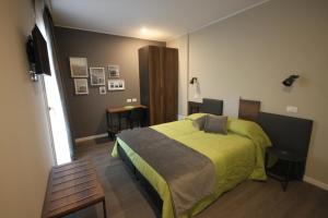 Postel nebo postele na pokoji v ubytování Pove 2.4 Hotel