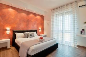 Säng eller sängar i ett rum på Coral Bay Charming House