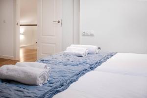 Posteľ alebo postele v izbe v ubytovaní Sánchez Pastor FreshApartments