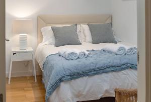 Posteľ alebo postele v izbe v ubytovaní Sánchez Pastor FreshApartments
