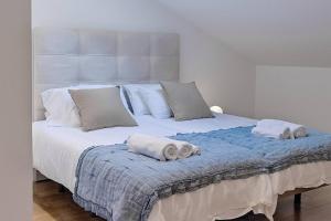 Posteľ alebo postele v izbe v ubytovaní Sánchez Pastor FreshApartments