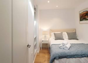Posteľ alebo postele v izbe v ubytovaní Sánchez Pastor FreshApartments