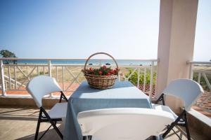 A balcony or terrace at "By The Sea" Family apartments