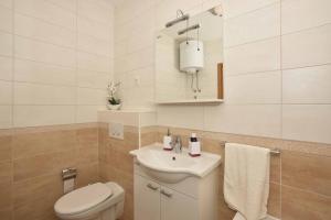 Koupelna v ubytování Apartman Ramljak + 33 fotografií