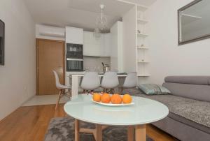 Kuchyň nebo kuchyňský kout v ubytování Apartman Ramljak