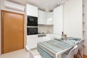 Kuchyň nebo kuchyňský kout v ubytování Apartman Ramljak