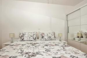 Postel nebo postele na pokoji v ubytování Apartman Ramljak